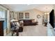 Spacious living room featuring vaulted ceilings, neutral paint, tile floors, and ample natural light at 2304 Bonn Ct, Punta Gorda, FL 33983