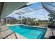 Refreshing enclosed swimming pool, ideal for relaxing and staying cool in the summer at 2304 Bonn Ct, Punta Gorda, FL 33983