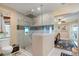 Walk-in shower with glass enclosure and decorative tile at 2304 Bonn Ct, Punta Gorda, FL 33983