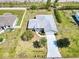 Charming single-story home with a well-maintained lawn and driveway in a quiet neighborhood at 23482 Moreland Ave, Port Charlotte, FL 33954