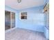 Enclosed sunroom with tile flooring and abundant natural light at 23482 Moreland Ave, Port Charlotte, FL 33954
