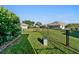 Well-maintained lawn and fence in a private backyard at 2363 Jasmine Way, North Port, FL 34287