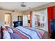 Spacious bedroom with patio access and modern furnishings at 2363 Jasmine Way, North Port, FL 34287