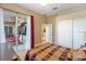 Comfortable bedroom with access to the patio at 2363 Jasmine Way, North Port, FL 34287