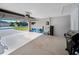 Clean and spacious garage offering ample space for parking and extra storage and gear at 2363 Jasmine Way, North Port, FL 34287