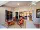 Outdoor patio area, furnished with comfortable seating, perfect for relaxation at 2363 Jasmine Way, North Port, FL 34287