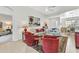 Comfortable living room with stylish furnishings, tile flooring, and an open floor plan at 24909 Drumblaire Ct, Port Charlotte, FL 33980