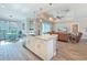 Open-concept kitchen with stainless appliances overlooking the dining and living areas at 25428 Islas Dr, Punta Gorda, FL 33955