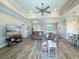 Cozy living room with tile floors, recessed lighting, and modern furnishings at 25428 Islas Dr, Punta Gorda, FL 33955