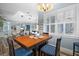 Cozy dining area with seating and a view of the living space at 303 W Grace St, Punta Gorda, FL 33950