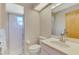 Bathroom featuring tile floors, a walk-in shower with glass doors and a toilet at 32 Long Meadow Ln, Rotonda West, FL 33947