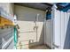 Convenient outdoor shower area enclosed with a white privacy fence at 32 Long Meadow Ln, Rotonda West, FL 33947