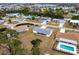 This aerial view shows the layout of this lovely home with a swimming pool at 3249 Sunrise Trl, Port Charlotte, FL 33952