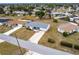 This aerial view shows the charming single story home with long driveway at 3249 Sunrise Trl, Port Charlotte, FL 33952