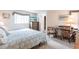 Serene bedroom with a peaceful atmosphere featuring plank flooring and a comfortable workstation at 3249 Sunrise Trl, Port Charlotte, FL 33952