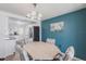Charming dining area leading to the renovated kitchen, perfect for entertaining guests and enjoying meals at 3249 Sunrise Trl, Port Charlotte, FL 33952