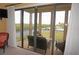 Relaxing balcony with comfortable seating and scenic water views at 3311 Purple Martin Dr # 126, Punta Gorda, FL 33950