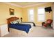 Bright bedroom with a queen-sized bed and plenty of natural light at 3311 Purple Martin Dr # 126, Punta Gorda, FL 33950