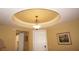 Foyer with decorative ceiling and chandelier, leading to main living area at 3311 Purple Martin Dr # 126, Punta Gorda, FL 33950