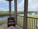 Relaxing screened lanai providing tranquil views of the waterway and surrounding landscape at 3311 Purple Martin Dr # 126, Punta Gorda, FL 33950