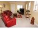 Comfortable living room with plush seating and sliding door access to the outdoors at 3311 Purple Martin Dr # 126, Punta Gorda, FL 33950