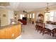Open-concept living space with modern finishes and ample natural light, seamlessly connecting the kitchen and living room at 3311 Purple Martin Dr # 126, Punta Gorda, FL 33950