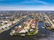 High angle aerial view of canal-front homes in a residential neighborhood at 3657 Aruba Ct, Punta Gorda, FL 33950