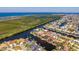 Aerial view of a waterfront home located on a canal with direct access to the open water at 3657 Aruba Ct, Punta Gorda, FL 33950