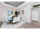 Dining area showcasing modern decor, elegant lighting, and a view of the outdoors at 3657 Aruba Ct, Punta Gorda, FL 33950
