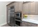 Kitchen features stainless steel appliances and custom cabinets at 3657 Aruba Ct, Punta Gorda, FL 33950
