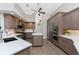 Spacious kitchen with gray cabinets, marble countertops and stainless steel appliances at 3657 Aruba Ct, Punta Gorda, FL 33950