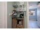 Hallway with view of coffee station and hallway leading to tiki bar at 4238 Gardner Dr, Port Charlotte, FL 33952