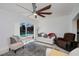 Cozy living room with sliding doors that offers a view to the refreshing outdoor pool area at 4238 Gardner Dr, Port Charlotte, FL 33952