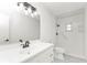 Bathroom boasts a new vanity, fixtures, and walk-in shower with safety bar at 4477 Shady Ln, Punta Gorda, FL 33980