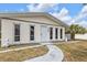 Home with a front walkway at 4477 Shady Ln, Punta Gorda, FL 33980