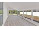Spacious sunroom with multiple windows provides natural light and backyard views at 4477 Shady Ln, Punta Gorda, FL 33980