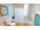 Standard bathroom with tiled shower/tub combination and natural light at 474 Elm Nw Ave, Port Charlotte, FL 33952