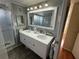Bathroom with double sink vanity and modern fixtures at 5025 Palena Blvd., North Port, FL 34287