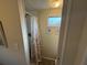 Bathroom with a shower, seashell curtain, and decorative wall art at 5025 Palena Blvd., North Port, FL 34287