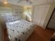 Bright bedroom with hardwood floors, closet and dresser at 5025 Palena Blvd., North Port, FL 34287