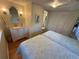 Bedroom featuring two beds, a granite vanity, and closet at 5025 Palena Blvd., North Port, FL 34287