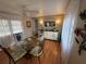 Inviting dining area featuring a glass table, elegant chairs, and a ceiling fan at 5025 Palena Blvd., North Port, FL 34287