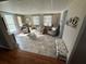 Bright living room featuring neutral colors, comfortable seating, and tile floors at 5025 Palena Blvd., North Port, FL 34287