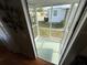View of the screen enclosed porch with an outdoor view at 5025 Palena Blvd., North Port, FL 34287