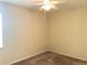Bedroom with carpet and ceiling fan and neutral color paint at 6379 Grand Cypress Blvd, North Port, FL 34287