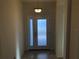 Bright and airy entryway featuring a decorative glass front door and neutral-toned tile flooring at 6379 Grand Cypress Blvd, North Port, FL 34287