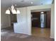 Open concept kitchen with stainless steel refrigerator and plenty of cabinets at 6379 Grand Cypress Blvd, North Port, FL 34287