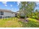 Landscaped backyard featuring an enclosed pool area and well-maintained lawn providing an inviting outdoor retreat at 7344 Arrowhead Run, Lakewood Ranch, FL 34202