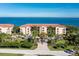 Aerial view of condo complex with palm trees near the water at 95 N Marion Ct # 226, Punta Gorda, FL 33950