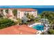 Luxurious condo complex overlooking a sparkling pool and offering beautiful views of the surrounding landscape at 95 N Marion Ct # 226, Punta Gorda, FL 33950